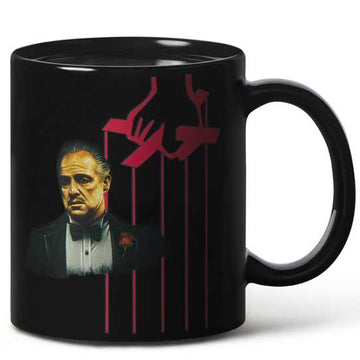 Black mug with a graphic design of a man in a suit and red abstract elements on a white background The Godfather movie featuing the likeness of marlon brando